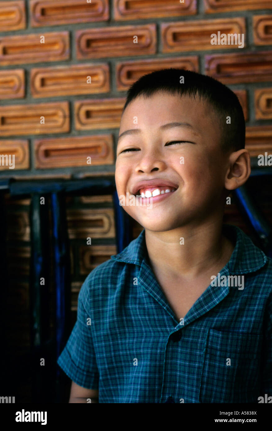 Portrait of a young smiling boy on the island of Ko Samui, Thailand. Stock Photo