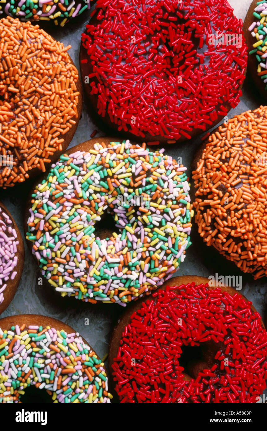 Donuts with sprinkles desert food Stock Photo
