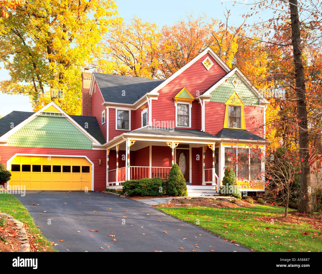 Exterior front view of colorfully painted multi story clapboard house