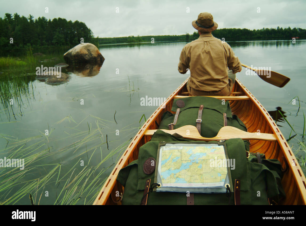 Paddling a canoe in Boundary Waters Canoe Area Wilderness BWCAW