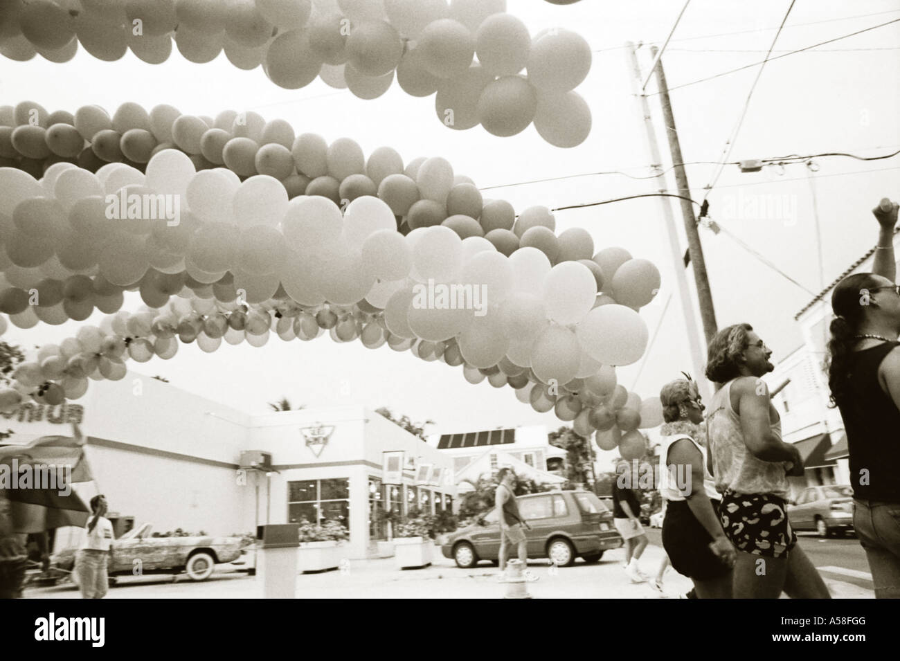 Tinted black and white landscape image of gay pride march in key west Florida. Stock Photo