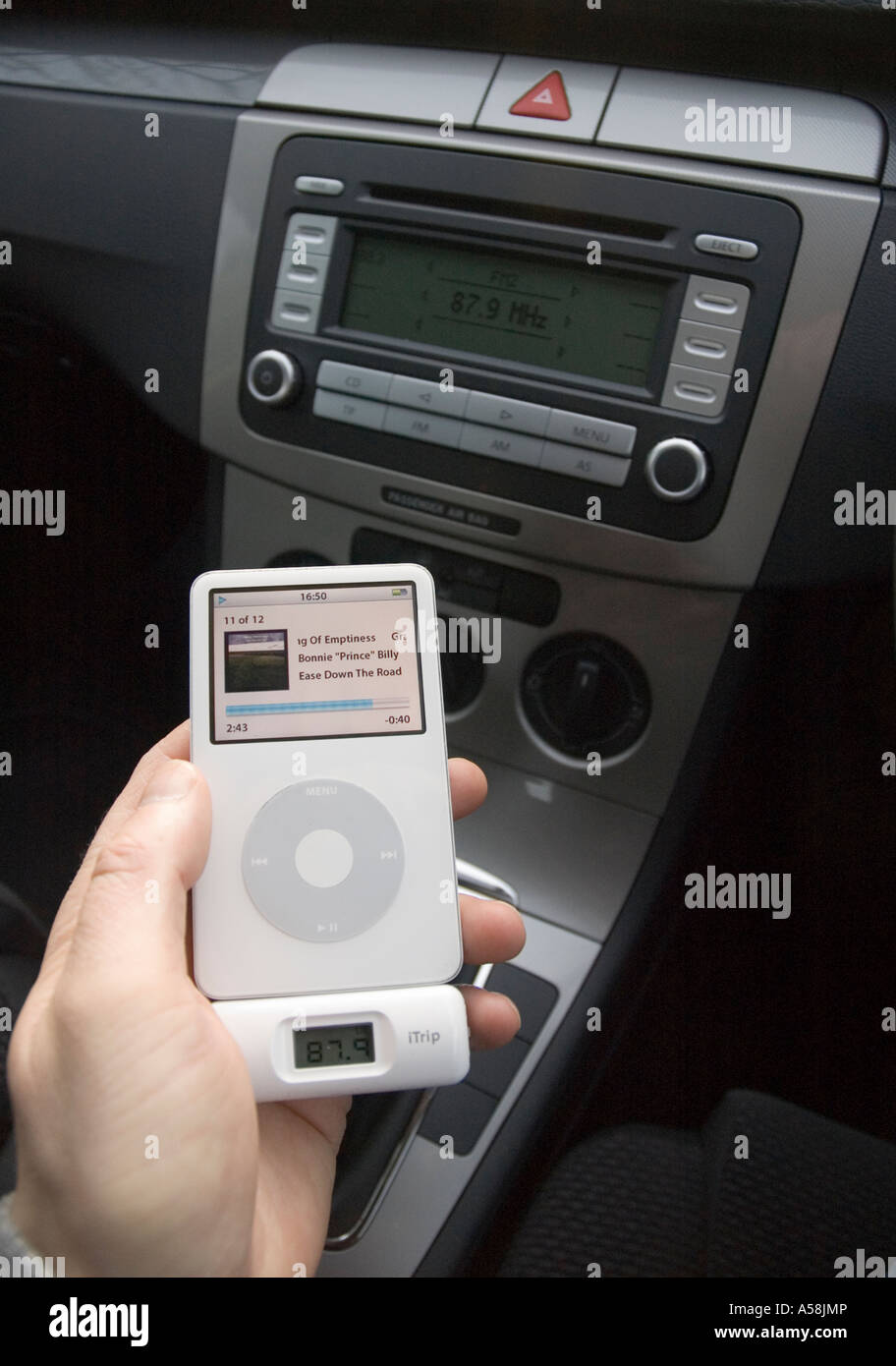 An ipod playing through a car stereo via an itrip short range fm transmitter  Stock Photo - Alamy