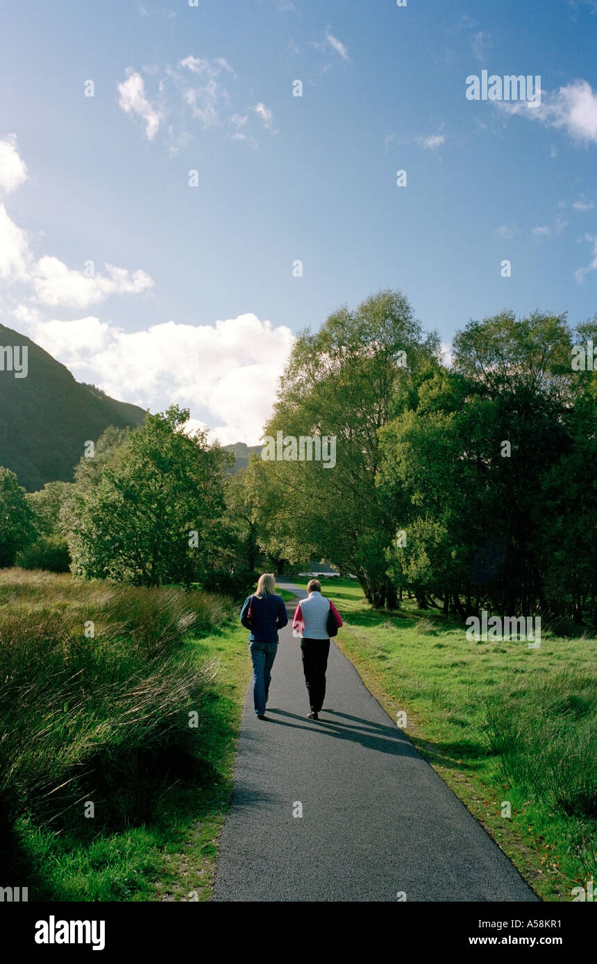 Two girls walking on path hi-res stock photography and images - Alamy