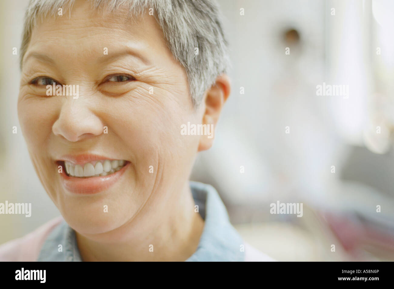Close up of senior Asian woman smiling Stock Photo