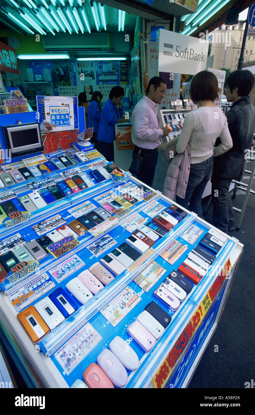 Japan, Tokyo, Akihabara Electrical District, Customers at Mobile Phone Store Stock Photo
