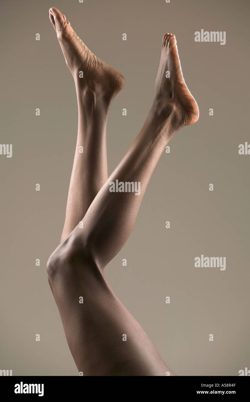 Legs and bare feet in air Stock Photo Alamy