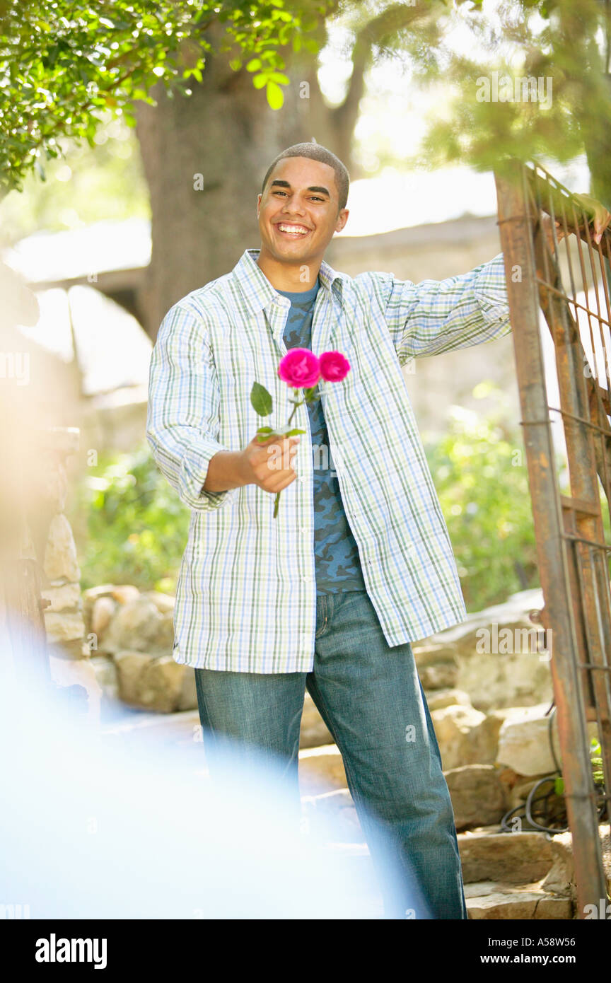 Man Among Roses Man roses hi-res stock photography and images - Alamy