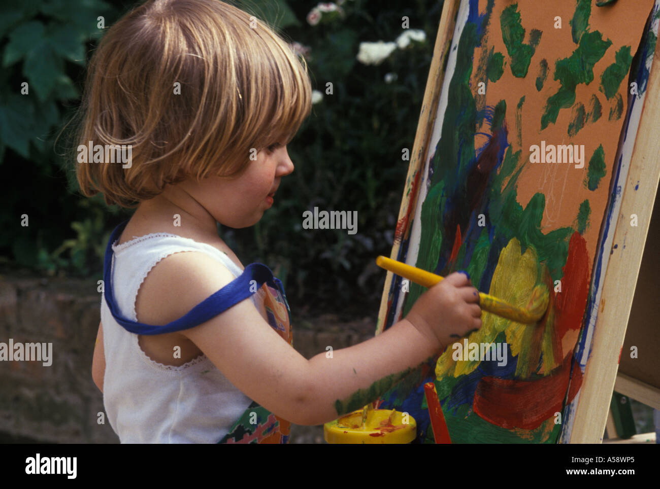 Toddler painting hi-res stock photography and images - Alamy