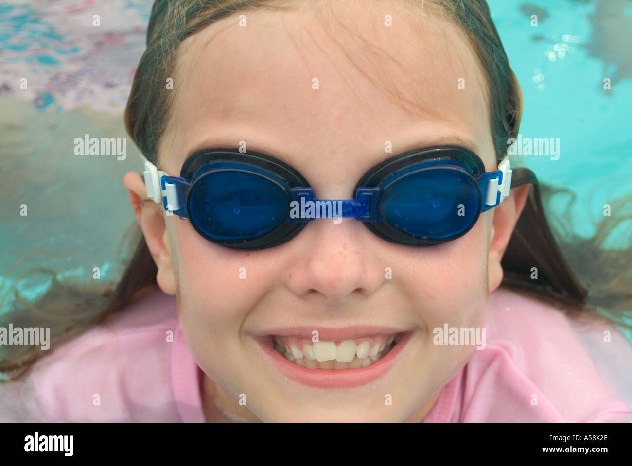 a child wearing swimming goggles Stock Photo Alamy