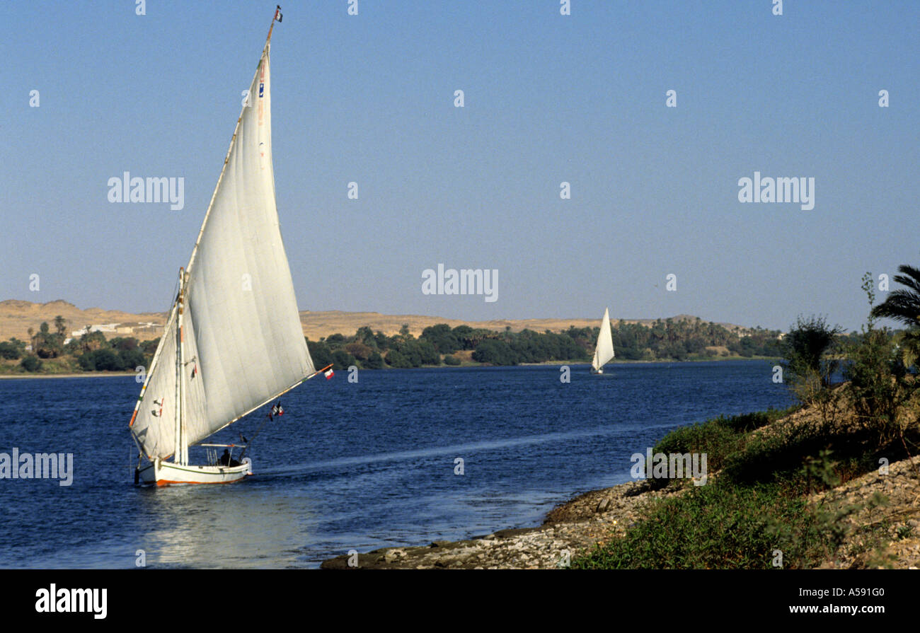 ship felucca boats on the Nile River Aswan Upper Egypt Egypt North ...