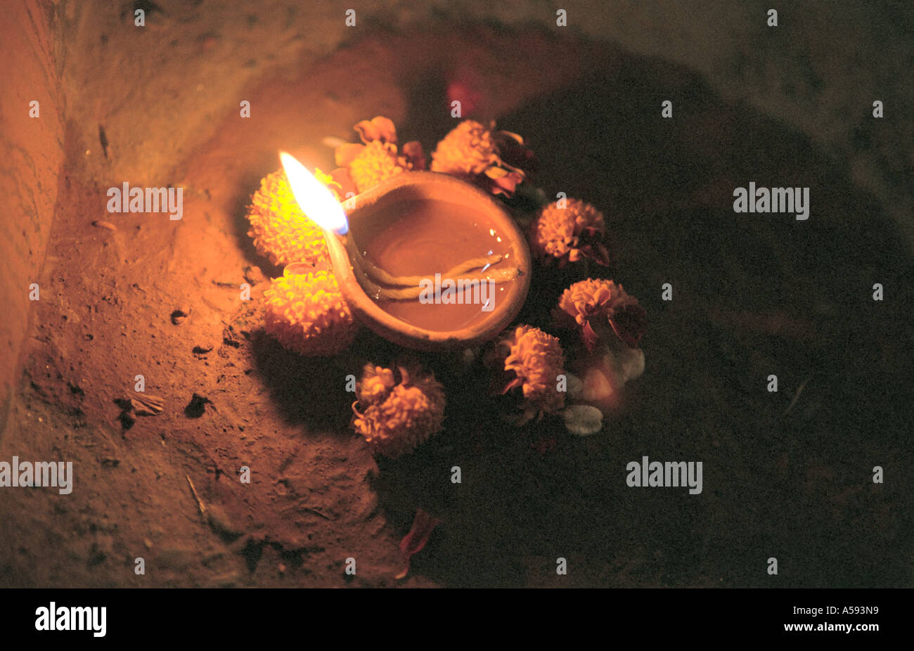 Burning oil lamp on street at Tihar Fistival of Lights third day