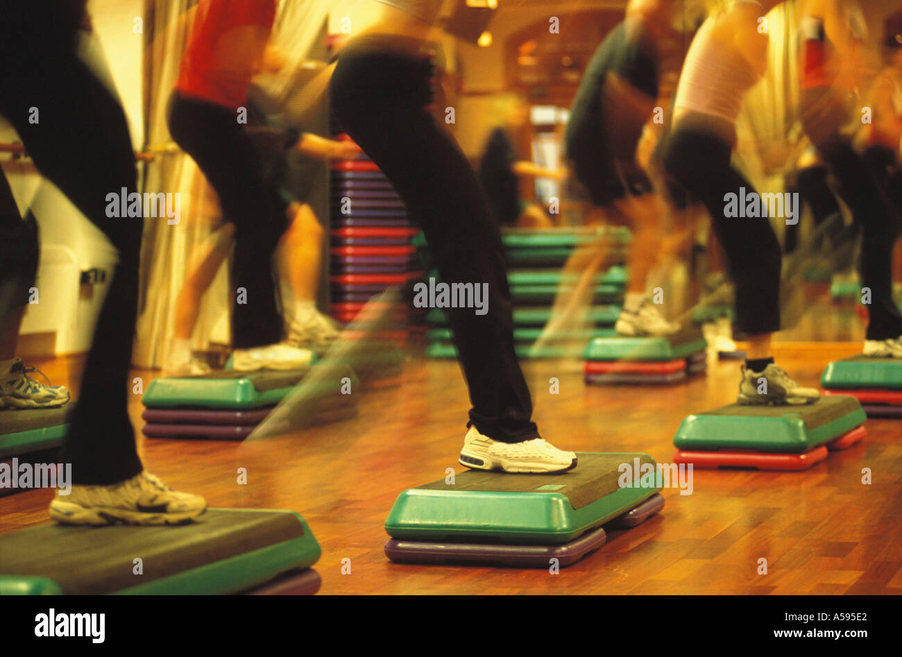 Legs and shoes in motion during stepping exercise class Stock Photo Alamy