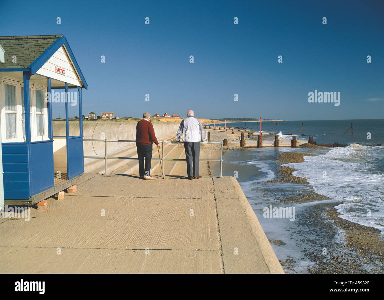 pensioners beside sea Southwold Suffolk UK Stock Photo