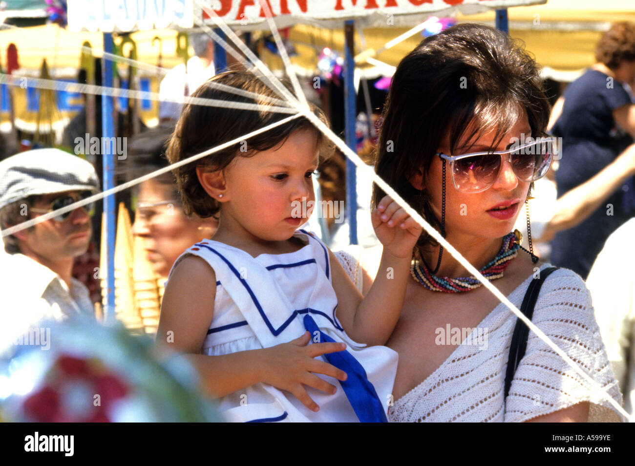 Malaga Beach Spain Spanish Mother Baby sun glasses Stock Photo