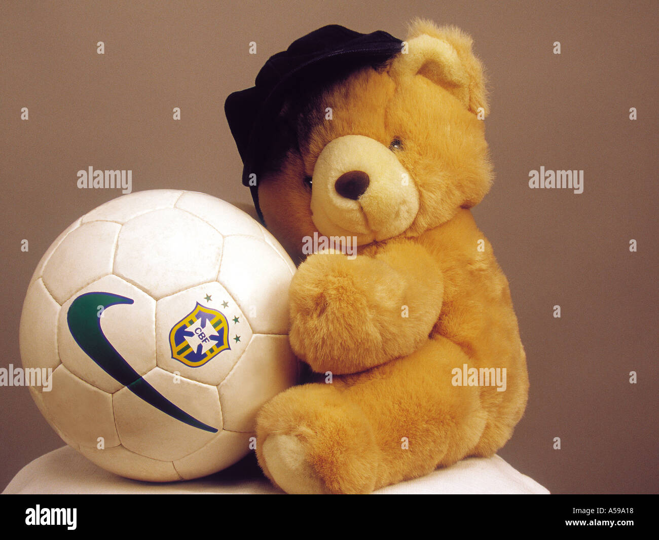 teddy bear with football Stock Photo - Alamy