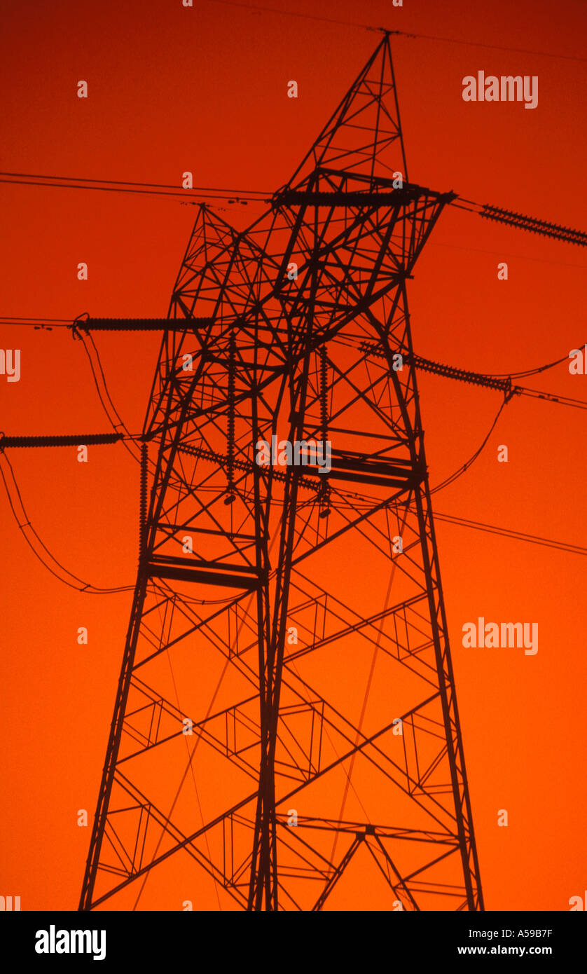 sunset silhouette of high voltage transmission tower Stock Photo - Alamy