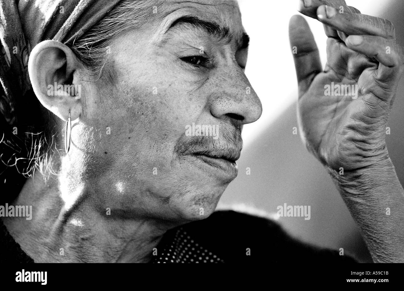 A Roma or Gypsy woman from Kosovo in a makeshift refugee camp in southern Serbia. Stock Photo