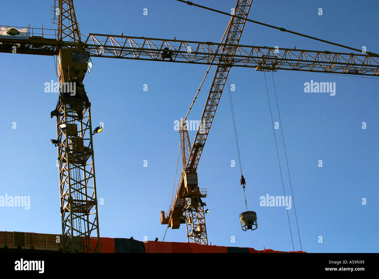 Cranes; Construction of office highrise in Calagary, Alberta, Canada