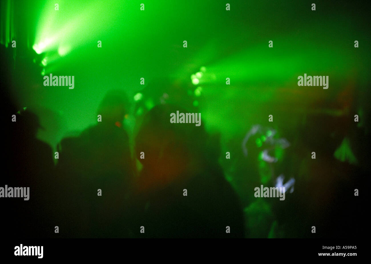 Crowds in green lights of Fabric Club in London Stock Photo Alamy