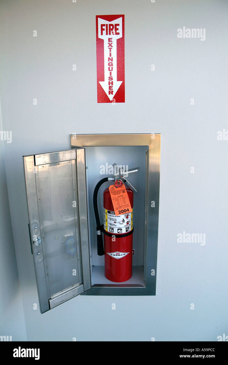 sign showing the location to a fire extinguisher Stock Photo Alamy