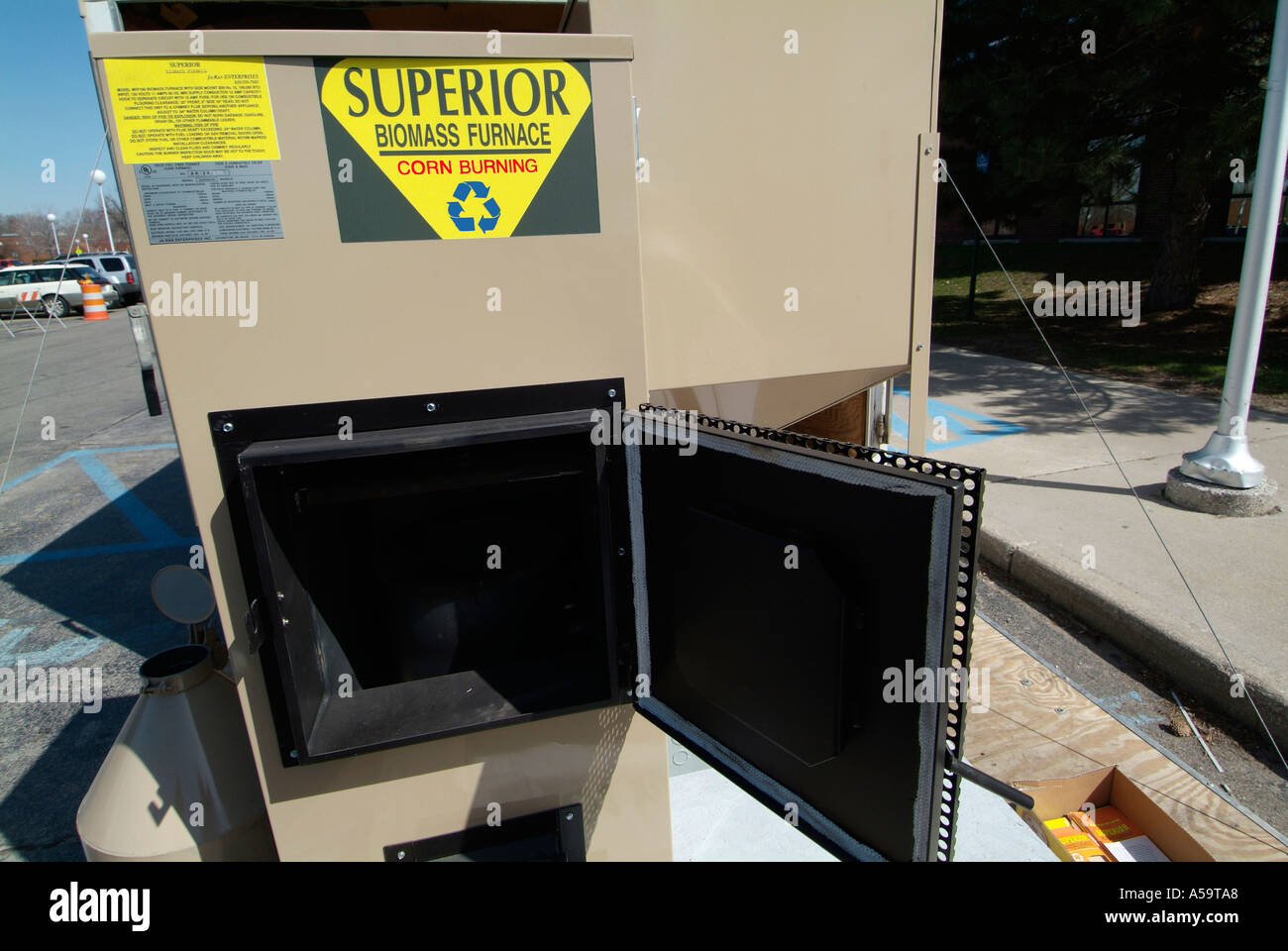 Home heating furnace that uses corn burning for fuel source Stock Photo