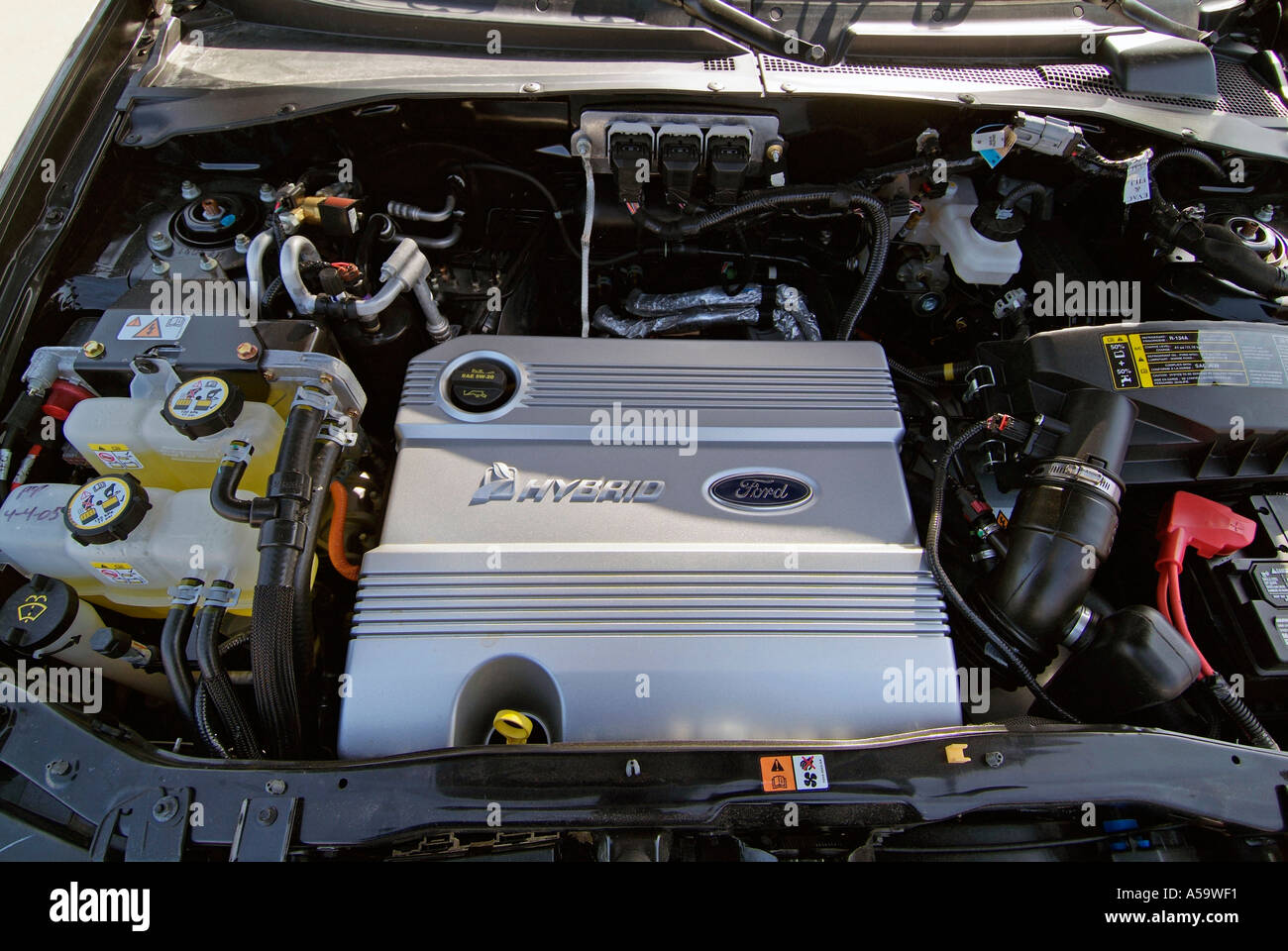 Engine compartment of a Hybrid synergy drive automobile Stock Photo