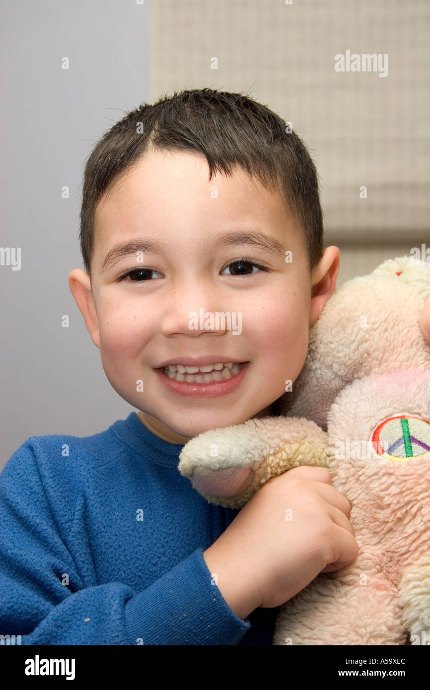 Four year old boy and teddy bear Stock Photo - Alamy