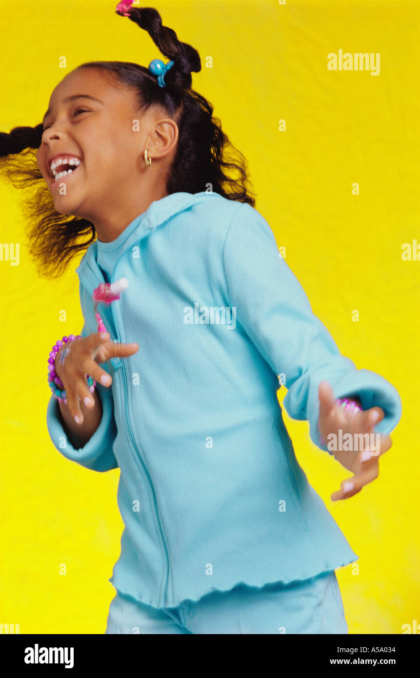 African American Girl Dancing with Braids Stock Photo - Alamy