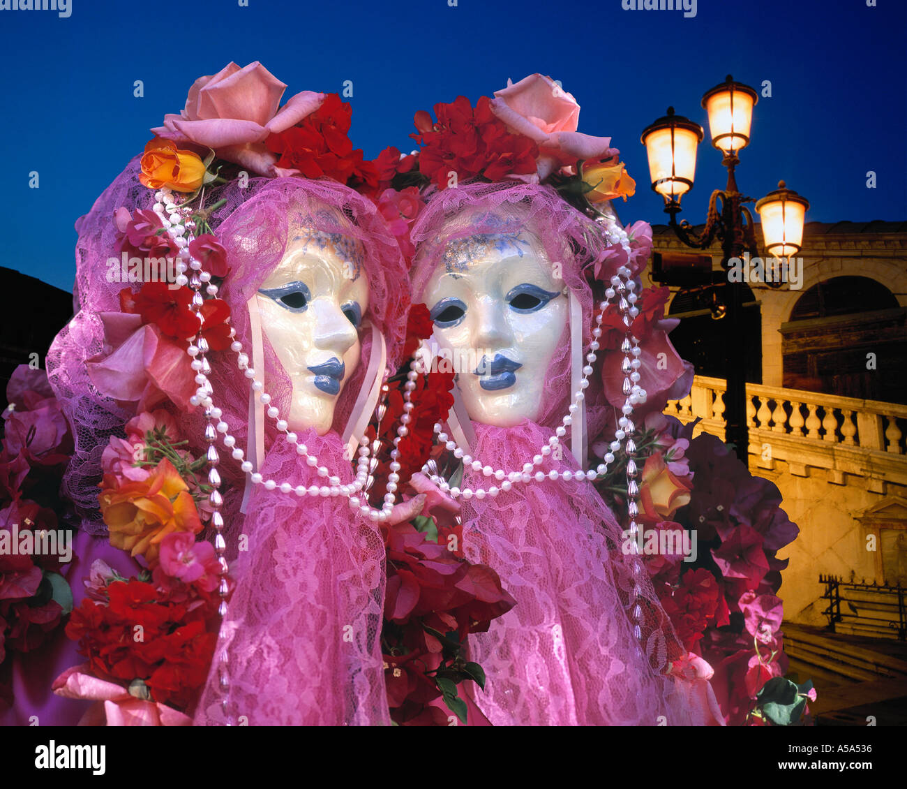 Carnival in Venice, Italy with the Rialto Bridge in the background Stock Photo