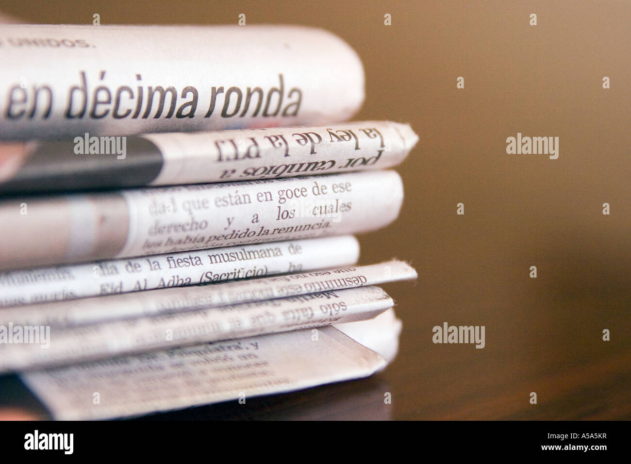 Stacked Spanish language Newspapers Stock Photo Alamy