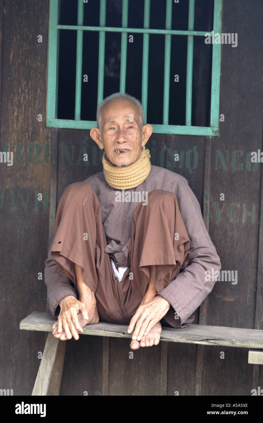 Old local man with traditional rope necklace, Mekong Delta, Vietnam Stock Photo