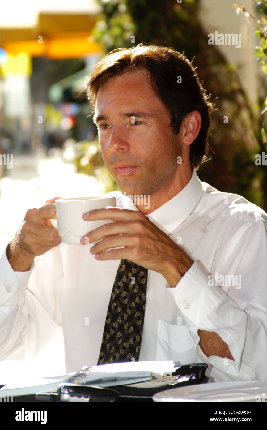 3120 Model released  man in street cafe Stock Photo