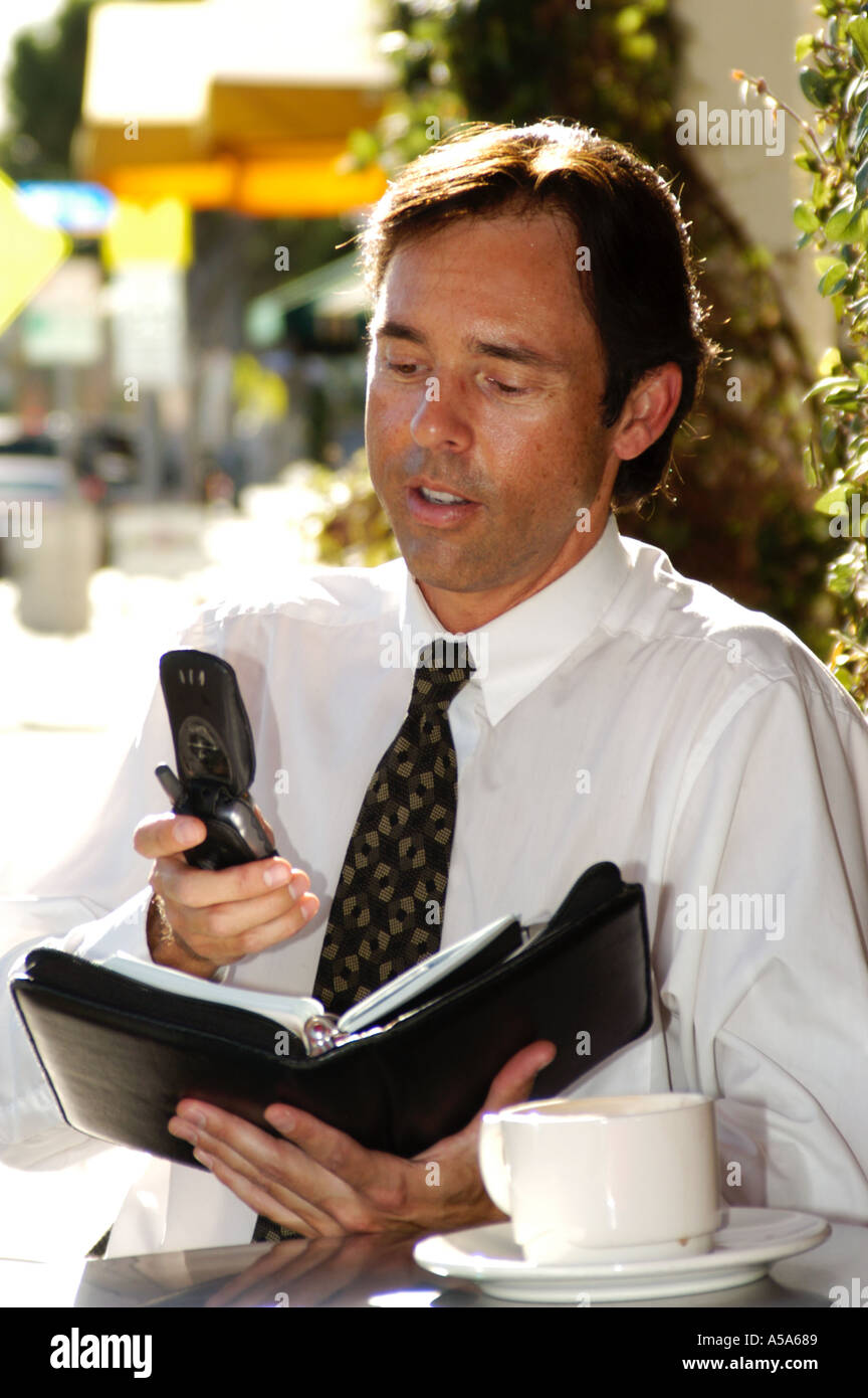 3120 Model released man in street cafe Stock Photo