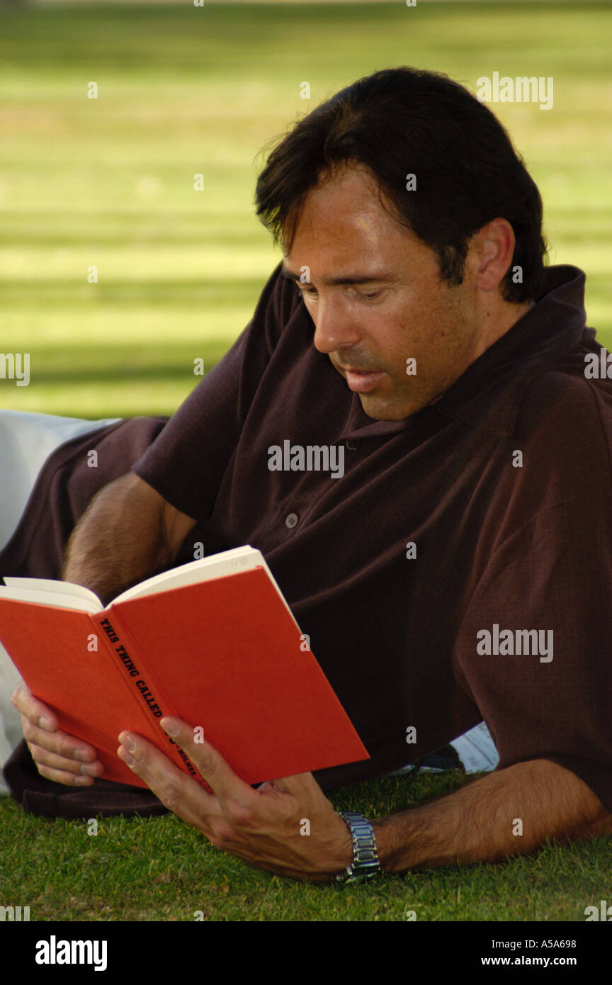 3120 Model released  Man reading book Stock Photo