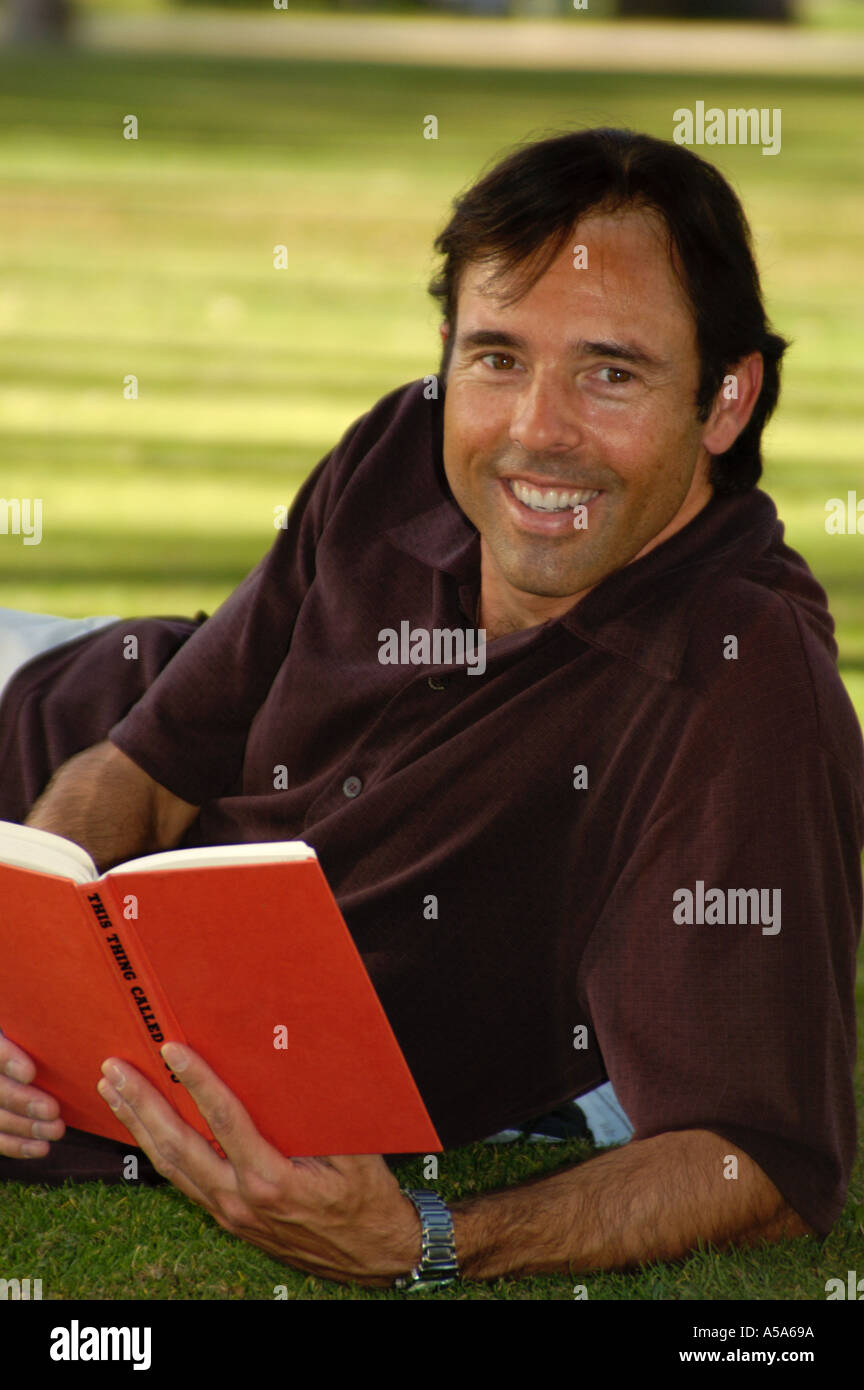 3120 Model released  Man reading book Stock Photo