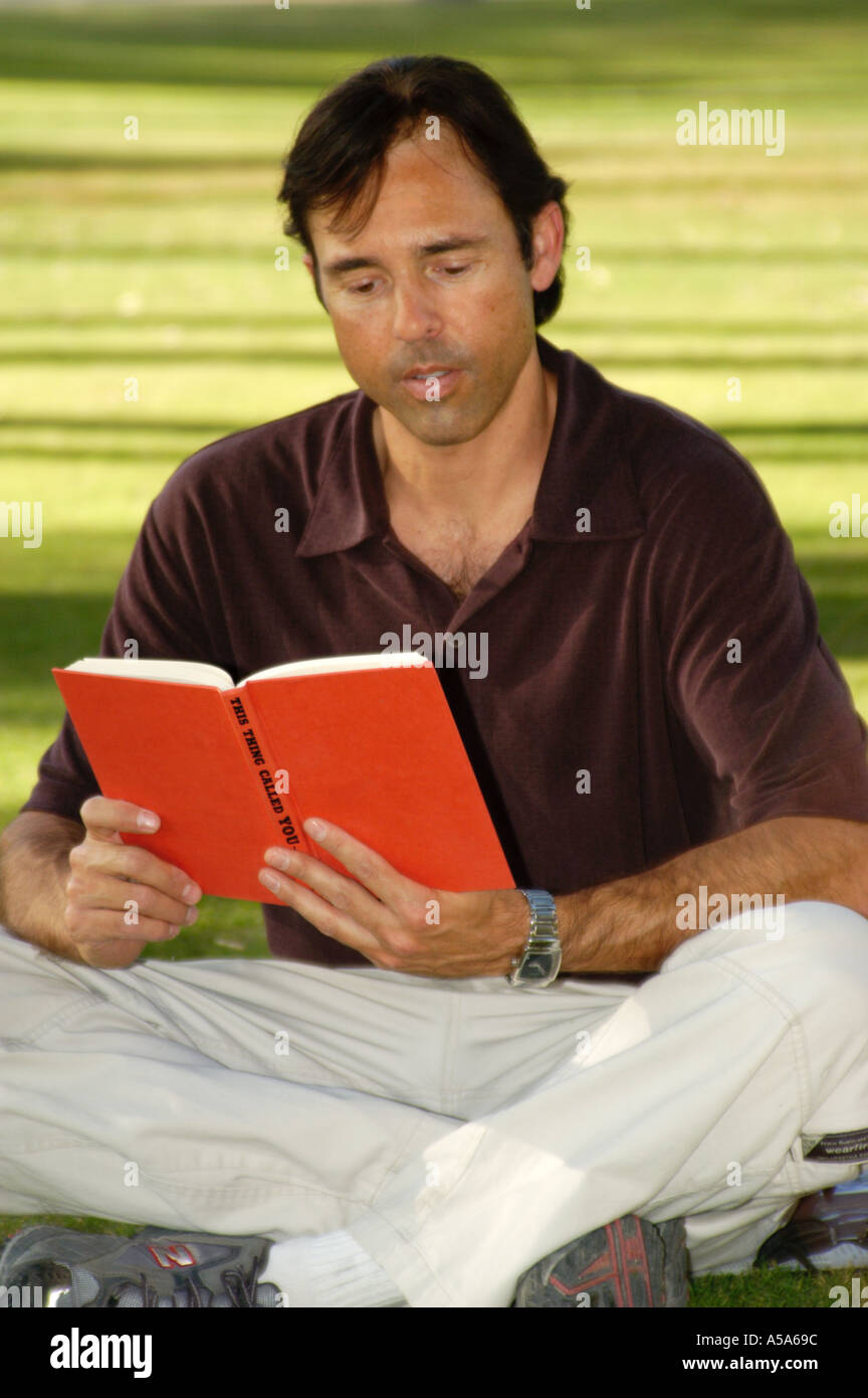 3120 Model released  Man reading book Stock Photo