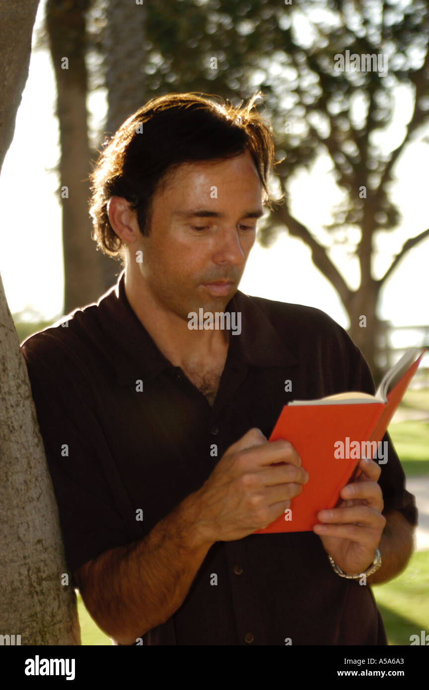 3120 Model released  Man reading book Stock Photo