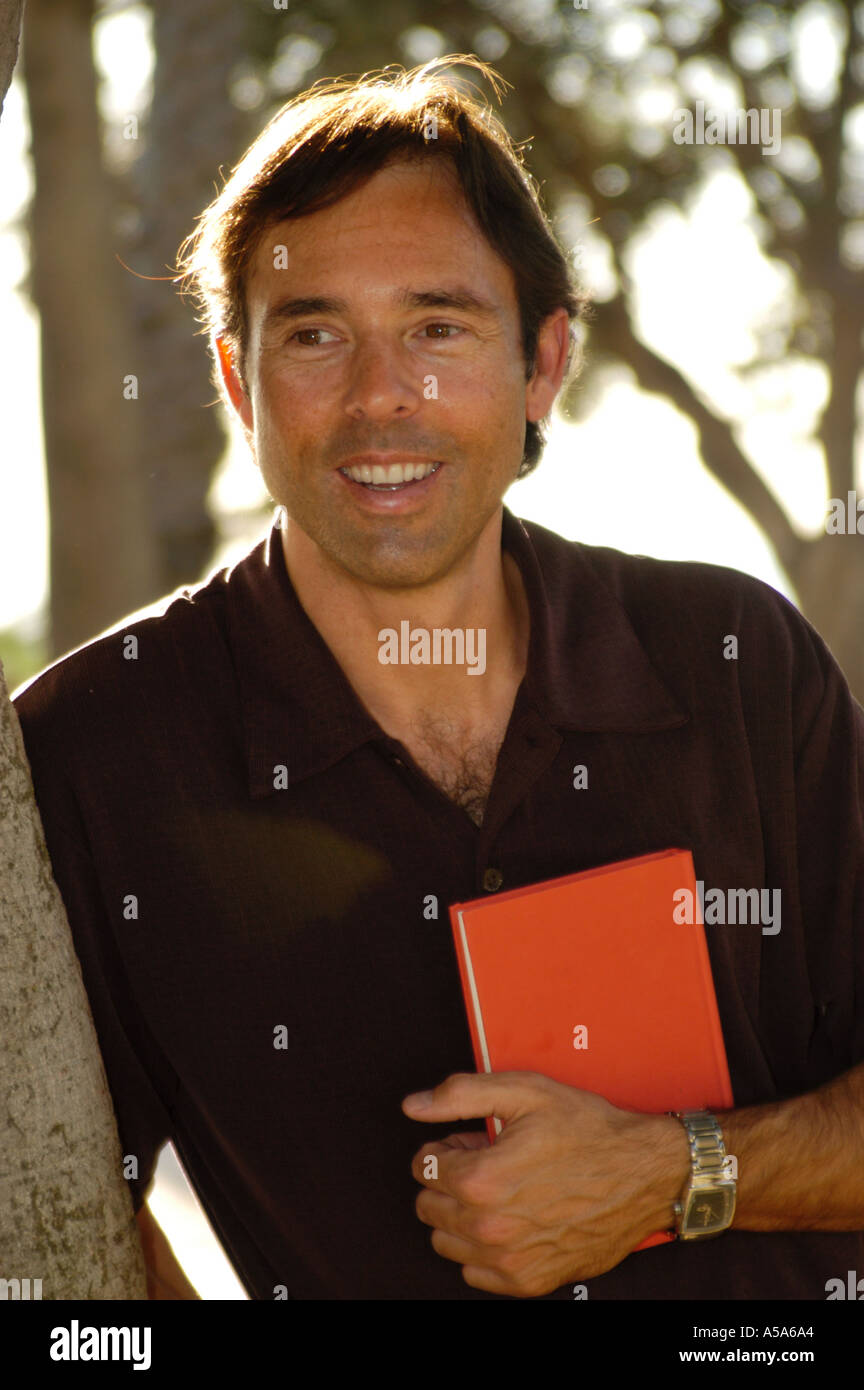 3120 Model released Man with book Stock Photo