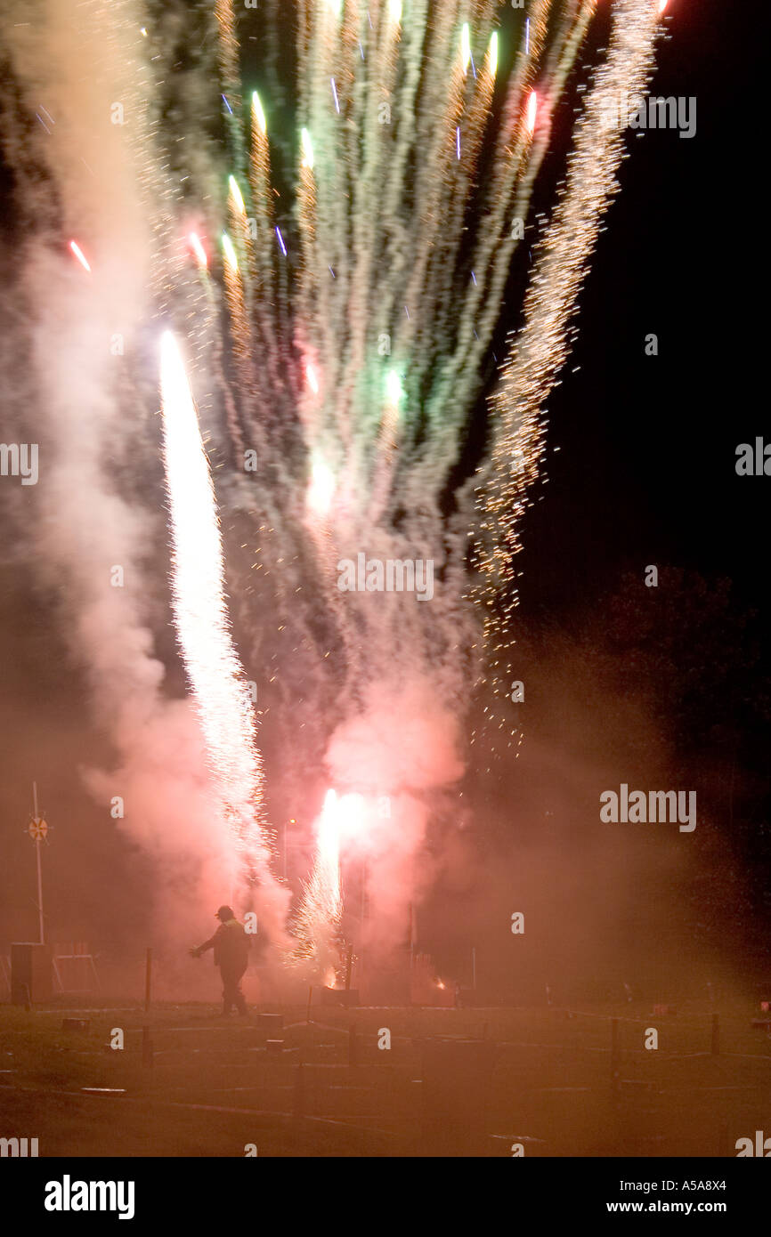 Fireworks being let off at an organised bonfire and firework display