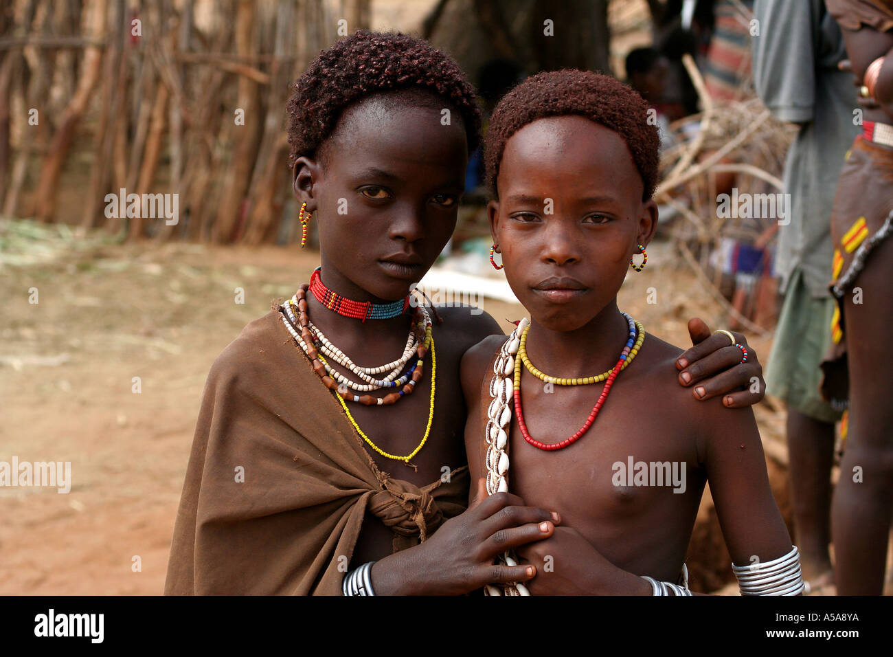 Hamer tribe children embrace, Turmi, Lower Omo Valle, Ethiopia Stock Photo