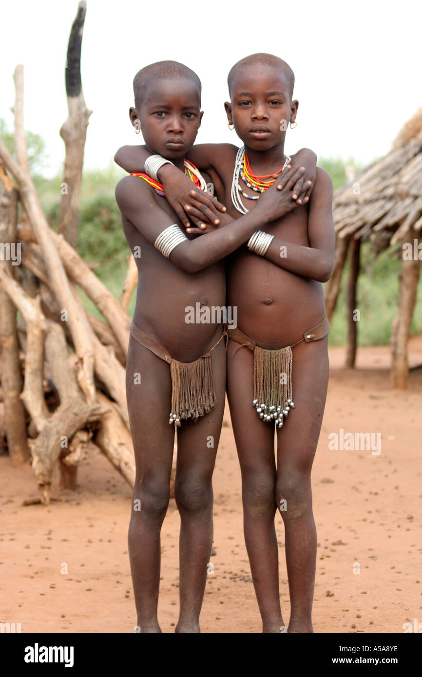 Hamer tribe children embrace, Turmi, Lower Omo Valle, Ethiopia Stock Photo