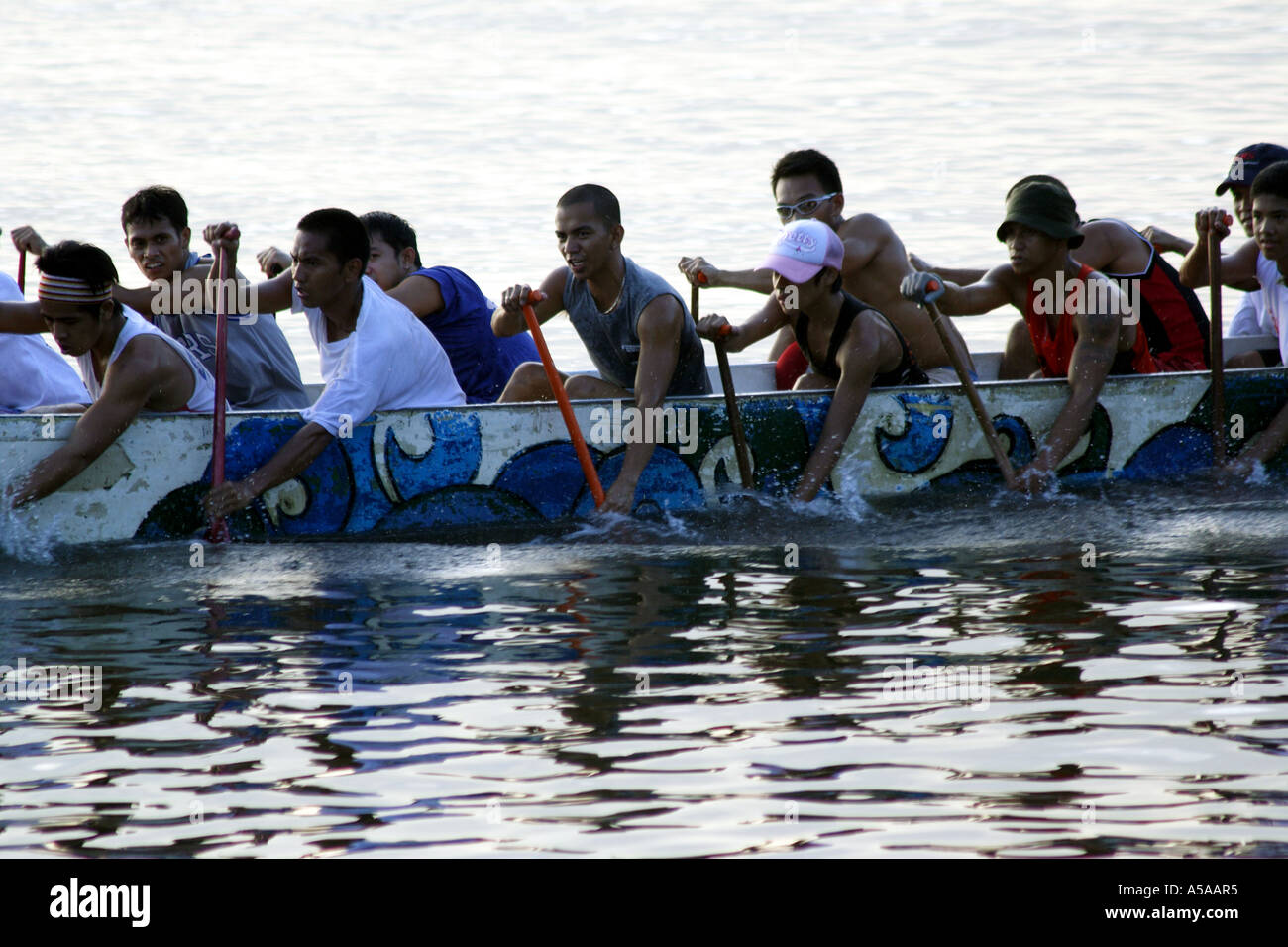 Manila, Philippine Islands, Manila Baywalk, team rowing dragon boat at