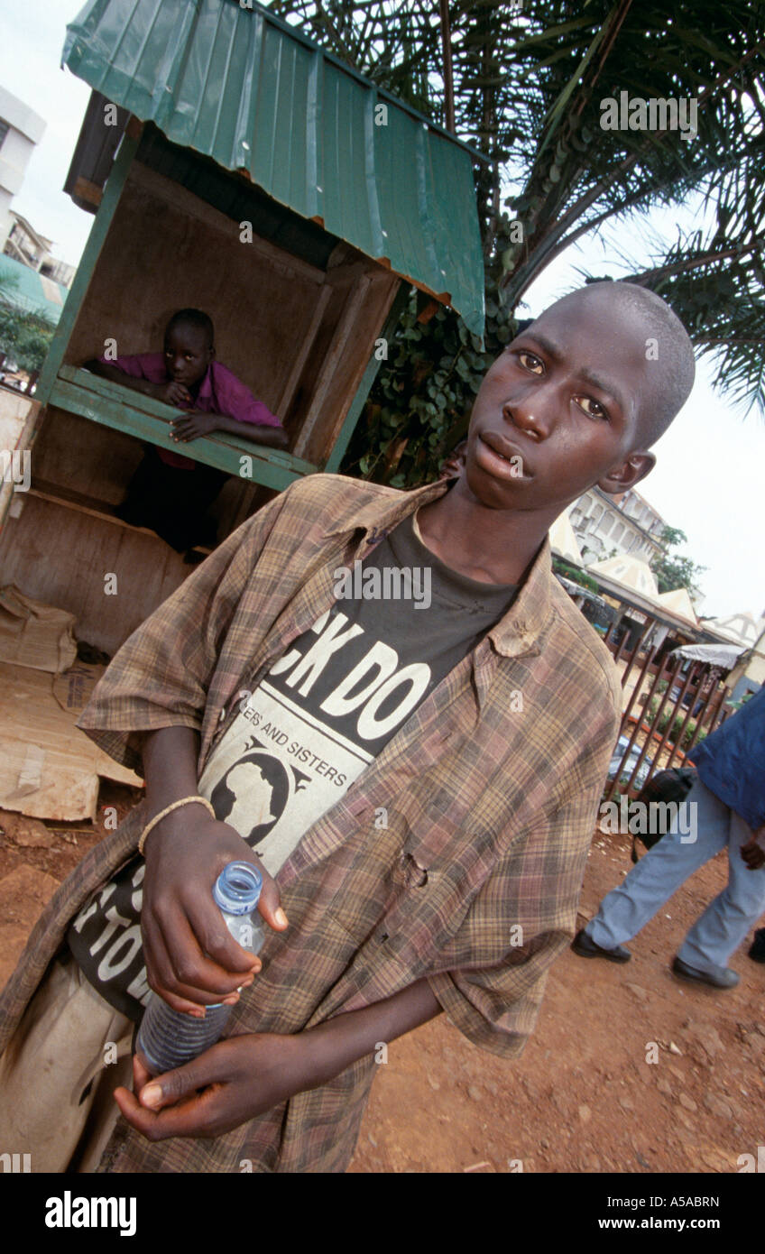 Young homeless glue-sniffers on street, Kampala, Uganda Stock Photo