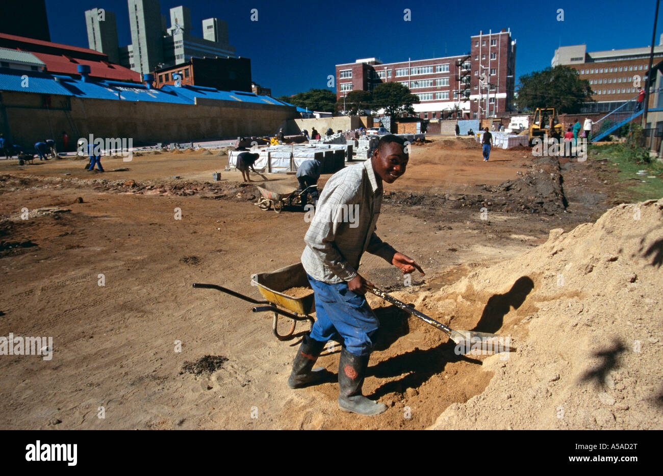 A construction worker at work on a building site in Johannesburg Stock ...
