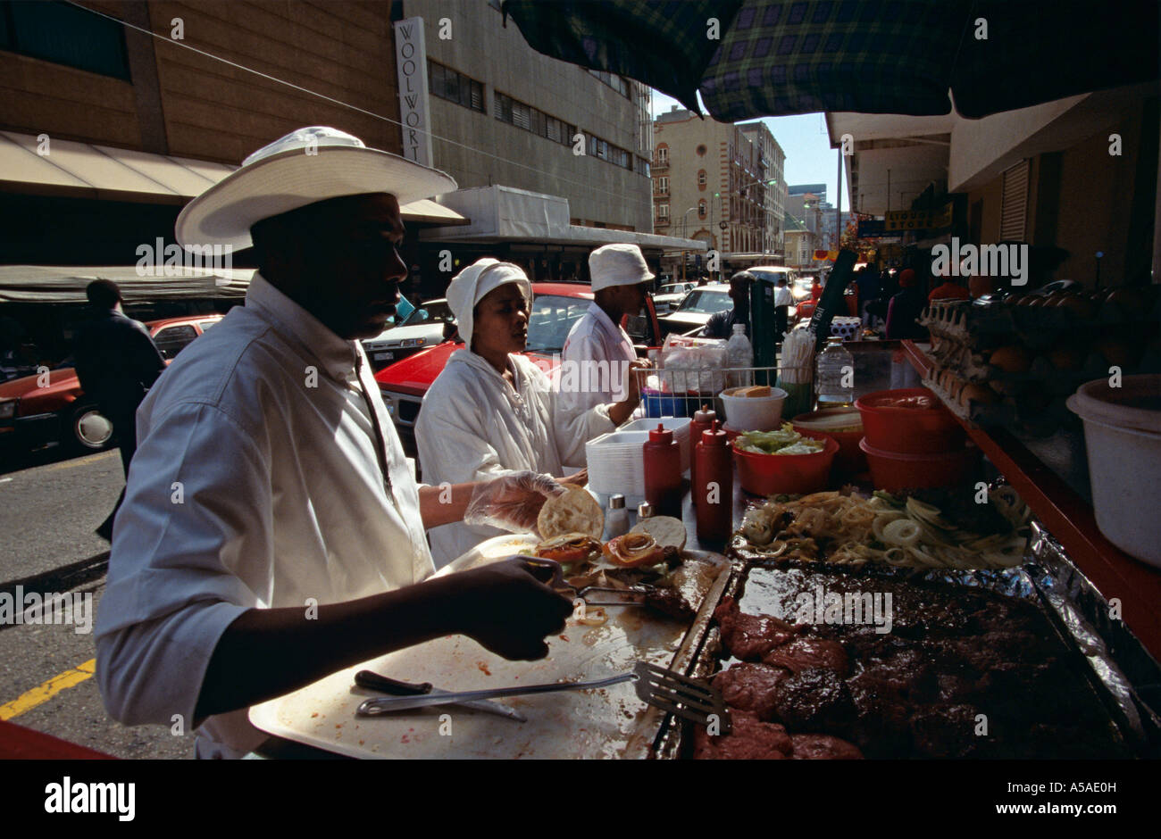 Food stalls line a small street in Johannesburg South Africa Stock Photo Alamy