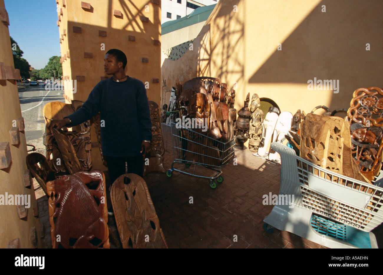A stall in Johannesburg selling native arts Stock Photo Alamy
