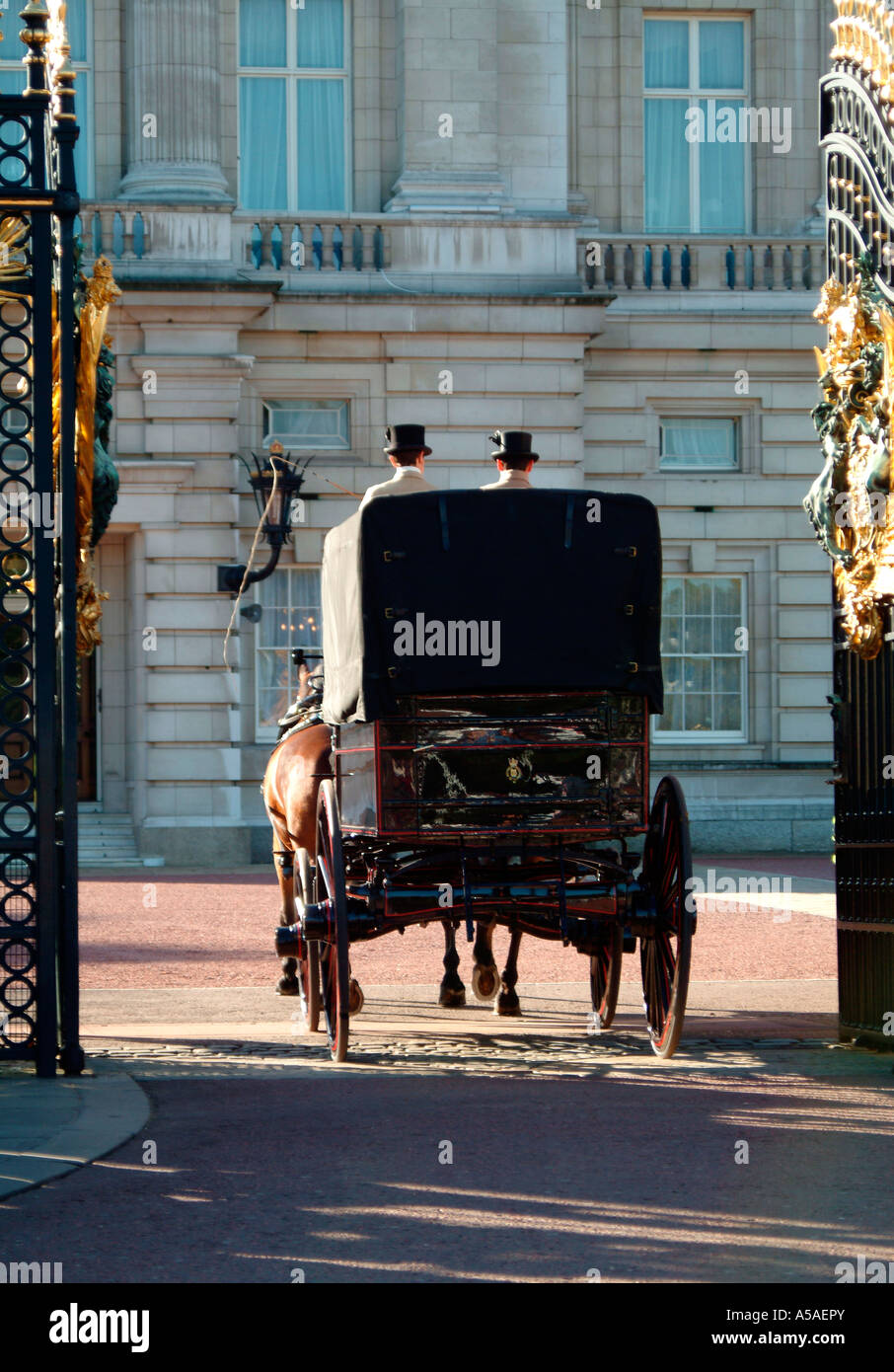 The Royal Mail coach delivering to Buckingham Palace London Stock Photo