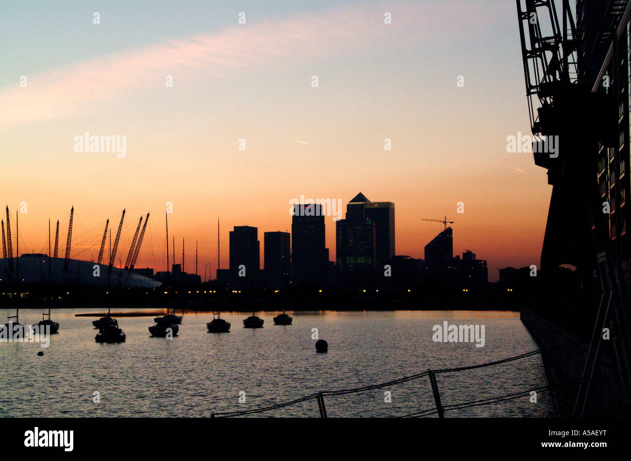 The O2 Dome and city buildings at sunset in Docklands London Stock ...