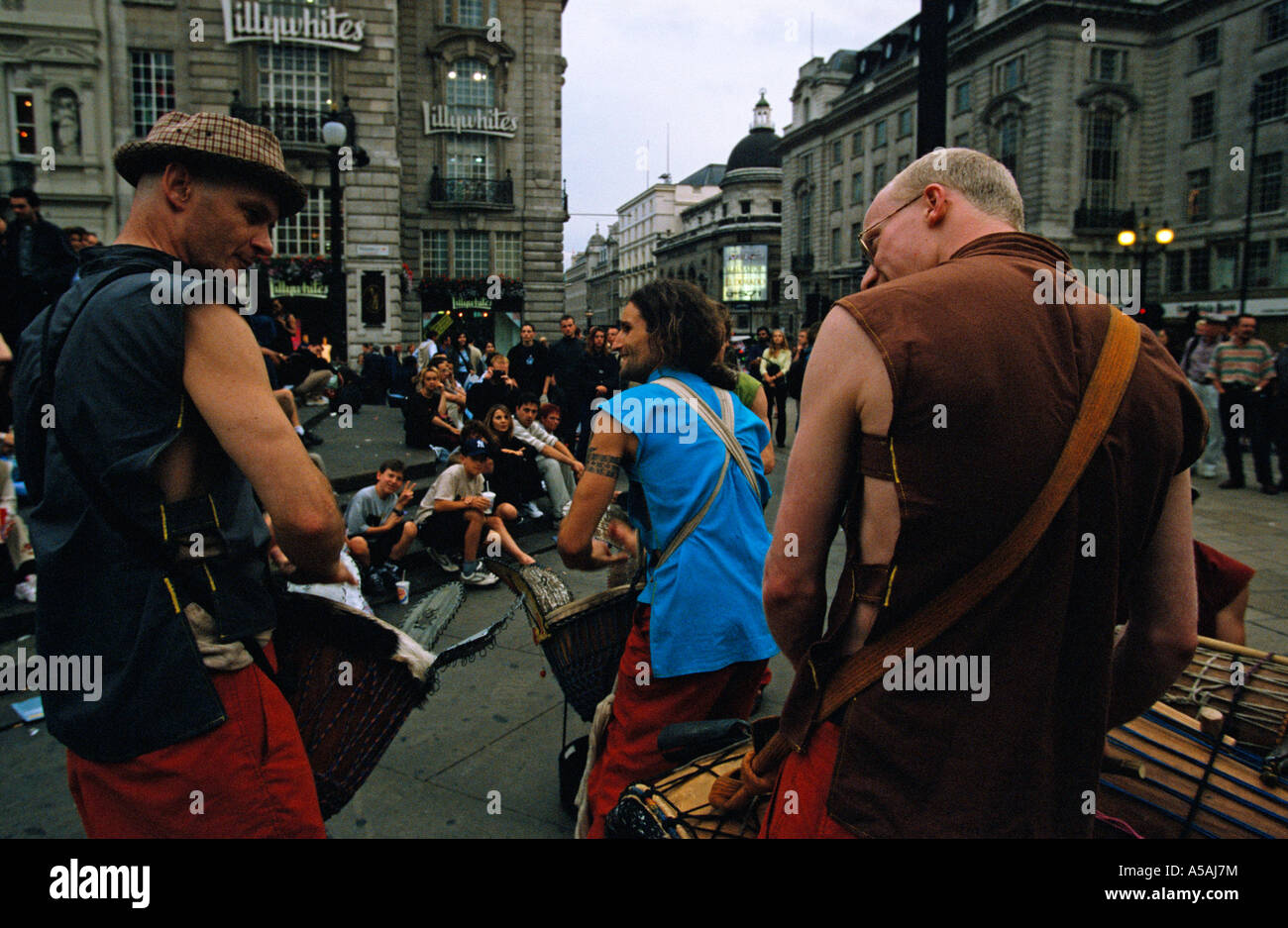 Street performers playing drums on a street in London Stock Photo Alamy