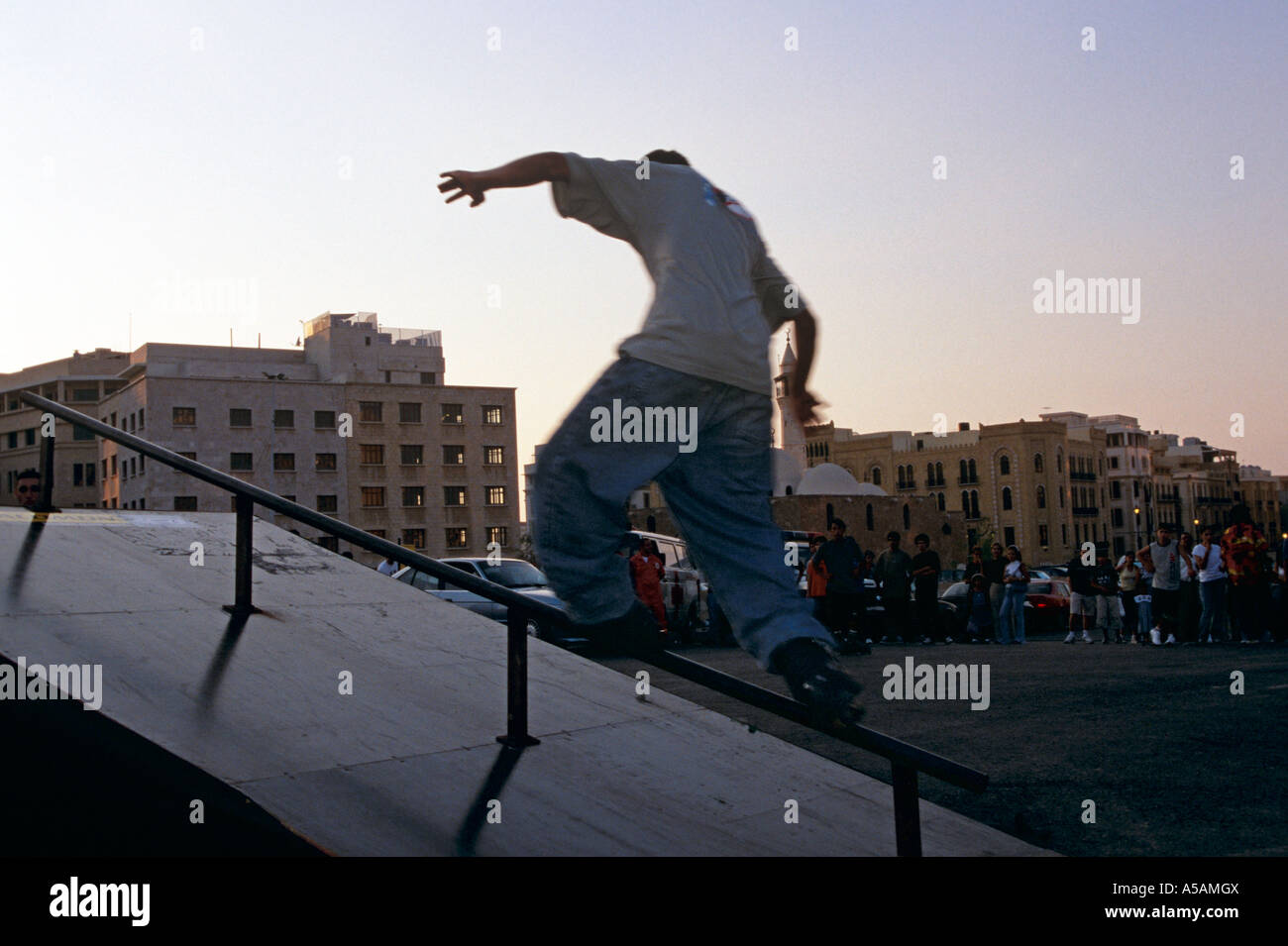 A boy skating on a railing Beirut Stock Photo - Alamy